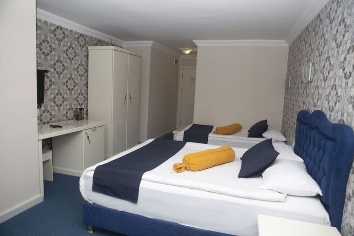 Imagen de la habitación del Hotel Can Grand Hotel. Foto 12