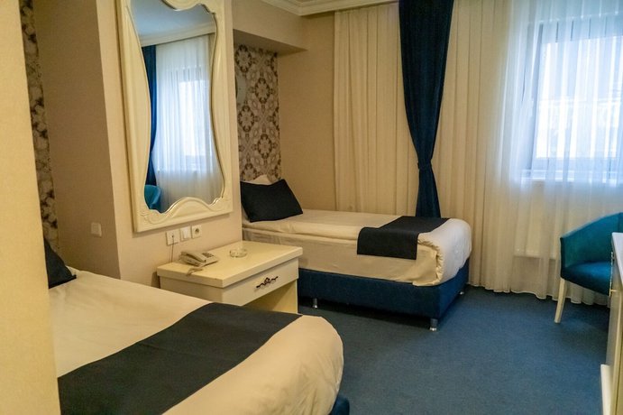 Imagen de la habitación del Hotel Can Grand Hotel. Foto 14