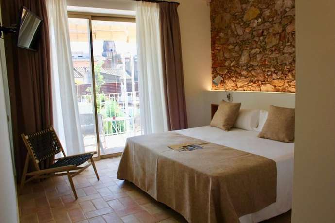 Imagen de la habitación del Hotel Can Liret. Foto 18