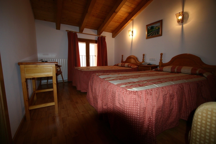 Imagen de la habitación del Hotel Can Mestre. Foto 11