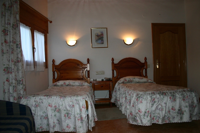 Imagen de la habitación del Hotel Can Mestre. Foto 12