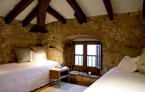 Imagen de la habitación del Hotel Can Mora De Dalt. Foto 11