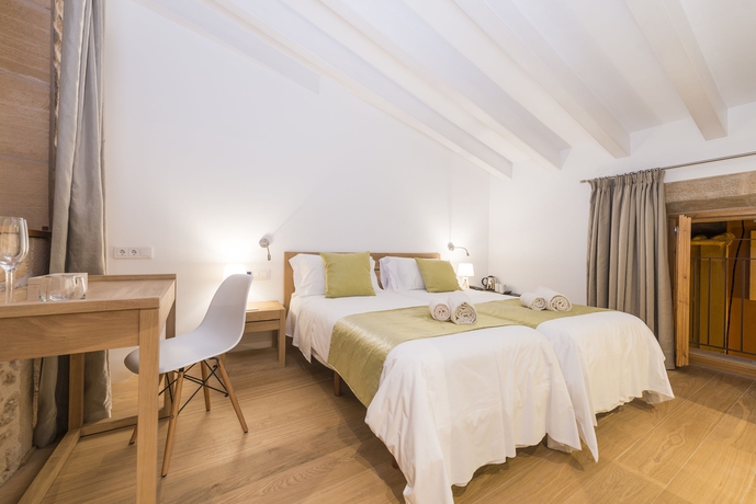 Imagen de la habitación del Hotel Can Mostatxins. Foto 13