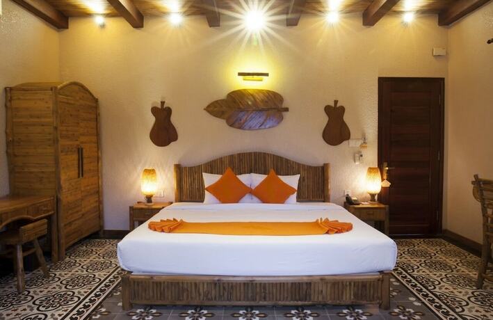 Imagen de la habitación del Hotel Can Tho Ecolodge. Foto 12