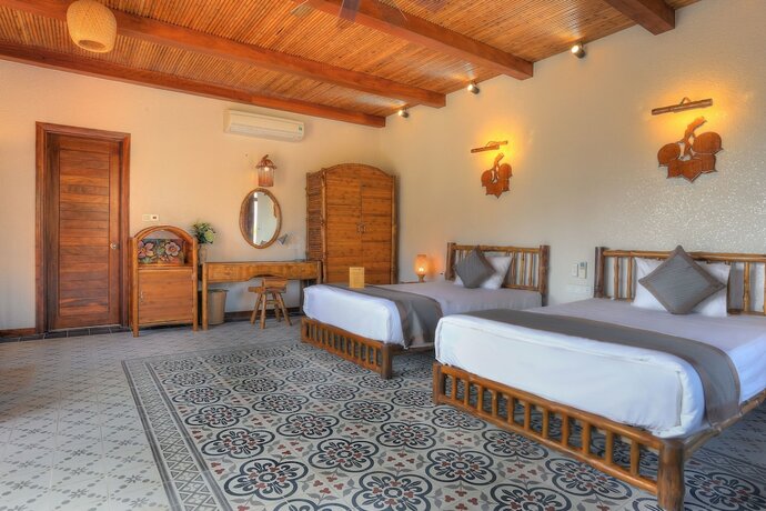 Imagen de la habitación del Hotel Can Tho Ecolodge. Foto 17