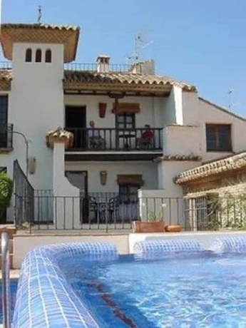 Imagen de la piscina del Hotel Canaan Boutique Ronda. Foto 19