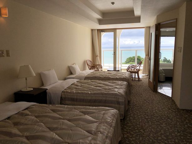 Imagen de la habitación del Hotel Canaan Coffee and Hotel. Foto 12