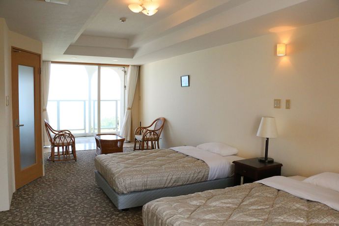 Imagen de la habitación del Hotel Canaan Coffee and Hotel. Foto 13