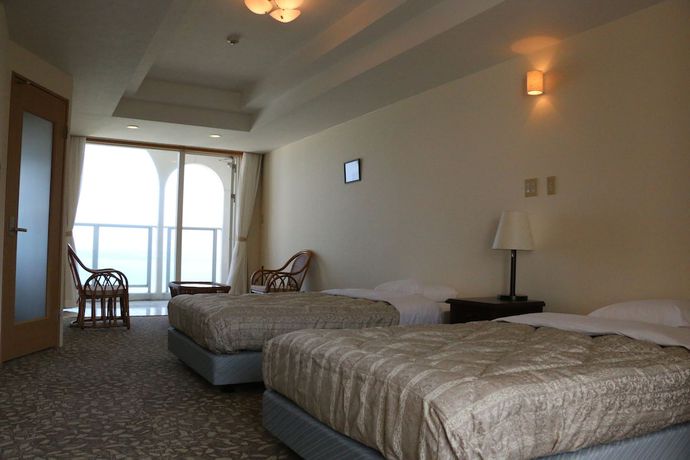 Imagen de la habitación del Hotel Canaan Coffee and Hotel. Foto 14