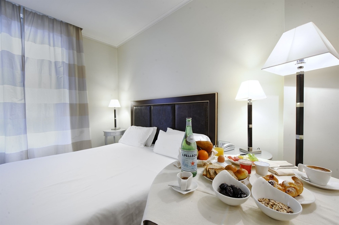 Imagen de la habitación del Hotel Canada, Milán. Foto 8