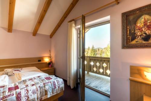Imagen de la habitación del Hotel Canada, Predazzo. Foto 4