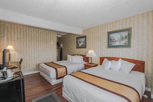 Imagen de la habitación del Hotel Canadas Best Value Inn Chinook Station. Foto 17
