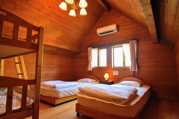 Imagen de la habitación del Hotel Canadian Log Cottage Takitaro. Foto 32