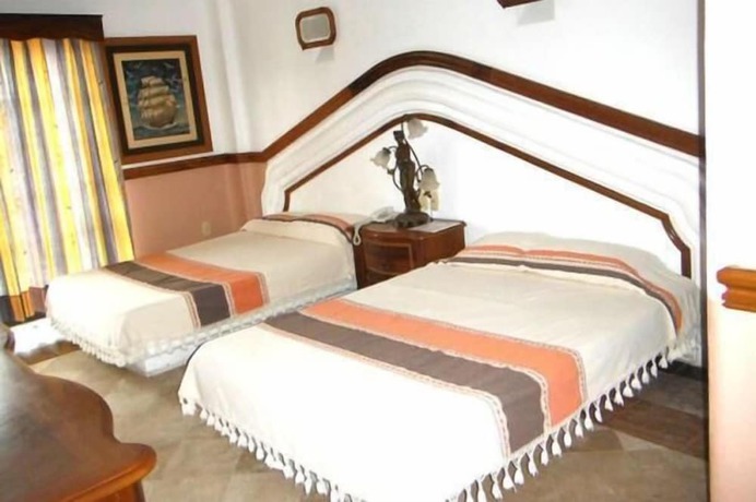 Imagen de la habitación del Hotel Canadian Resorts Huatulco. Foto 18