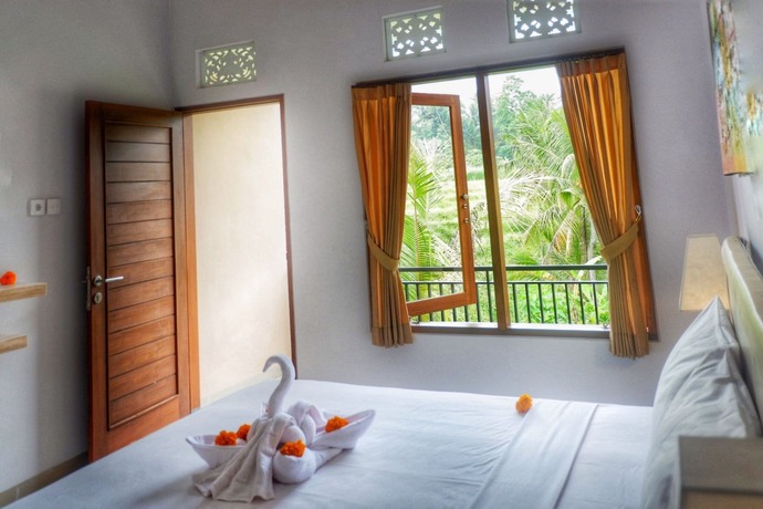 Imagen de la habitación del Hotel Canang Garden. Foto 8