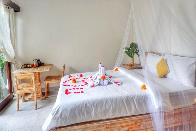 Imagen de la habitación del Hotel Canang Garden. Foto 13