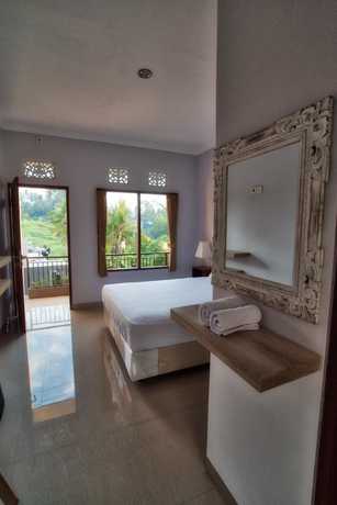 Imagen de la habitación del Hotel Canang Garden. Foto 16