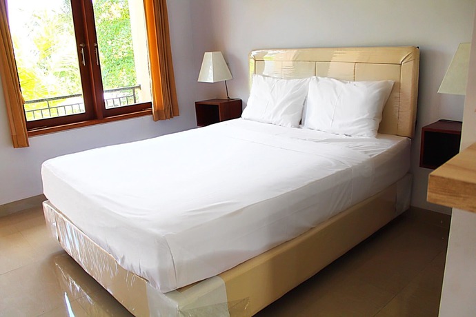 Imagen de la habitación del Hotel Canang Garden. Foto 17