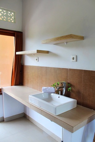 Imagen de la habitación del Hotel Canang Garden. Foto 19