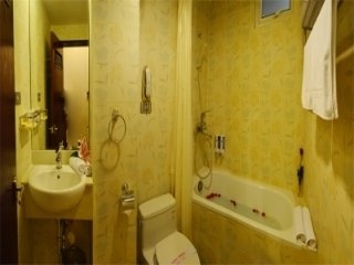 Imagen de la habitación del Hotel Canary Hanoi. Foto 11