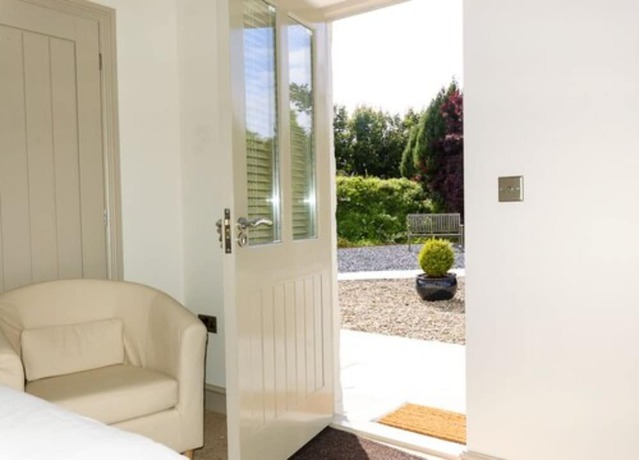 Imagen de la habitación del Hotel Canaston Oaks. Foto 6
