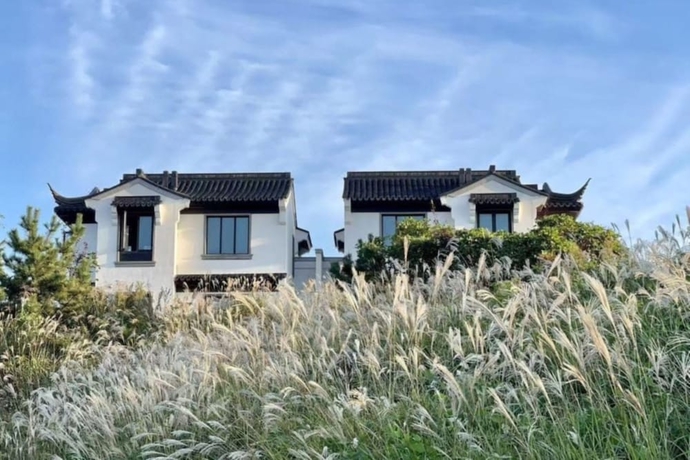 Imagen de la habitación del Hotel Canbeauty Golf Resort and SPA Weihai. Foto 6