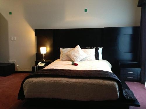 Imagen de la habitación del Hotel Cancalli Business & Suites. Foto 6