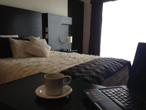 Imagen de la habitación del Hotel Cancalli Business & Suites. Foto 7