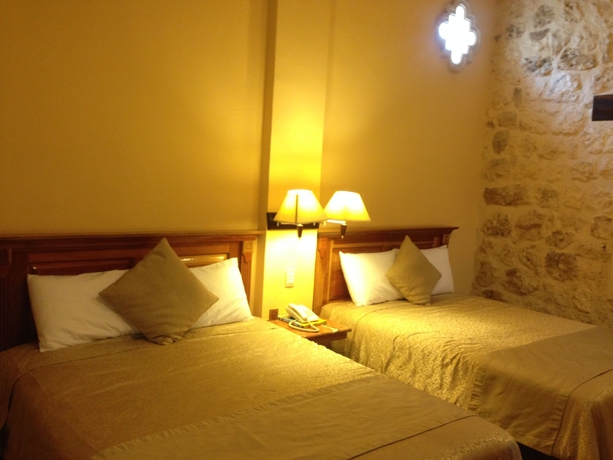 Imagen de la habitación del Hotel Cancun International Suites. Foto 3
