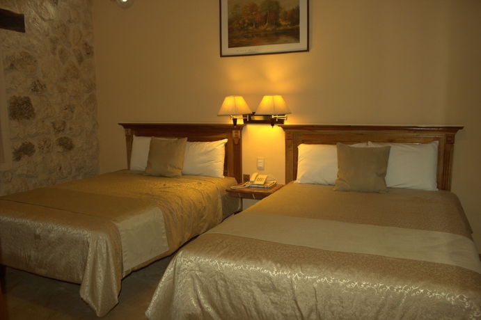Imagen de la habitación del Hotel Cancun International Suites. Foto 9
