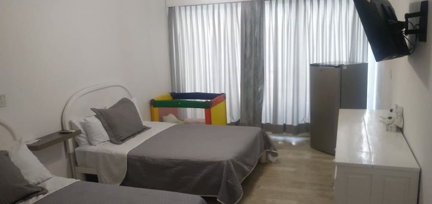 Imagen de la habitación del Hotel Cancun Plaza Condo. Foto 12