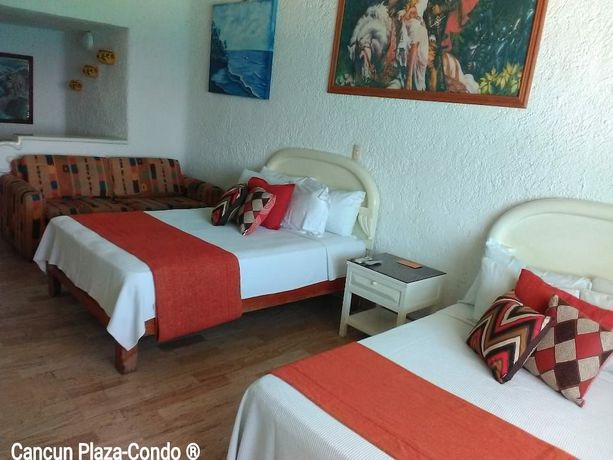 Imagen de la habitación del Hotel Cancun Plaza Condo. Foto 15