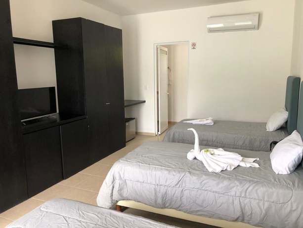 Imagen de la habitación del Hotel Cancun Tennis Inn. Foto 9