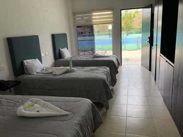 Imagen de la habitación del Hotel Cancun Tennis Inn. Foto 11