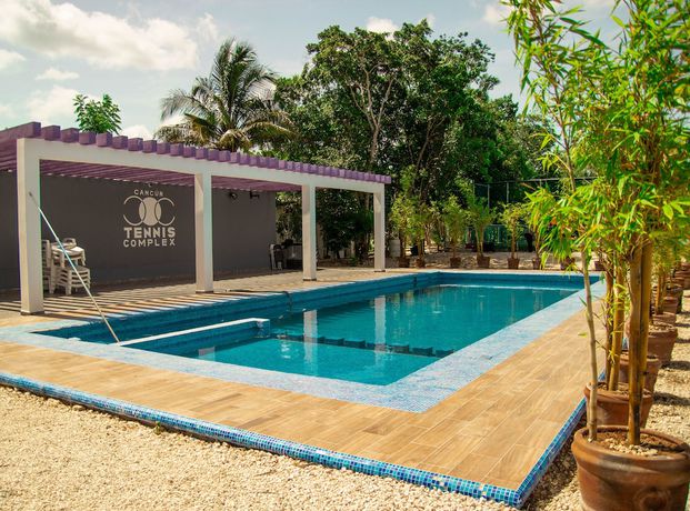 Imagen de la piscina del Hotel Cancun Tennis Inn. Foto 19