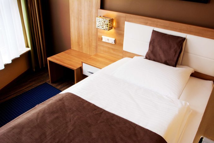 Imagen de la habitación del Hotel CandS. Foto 11