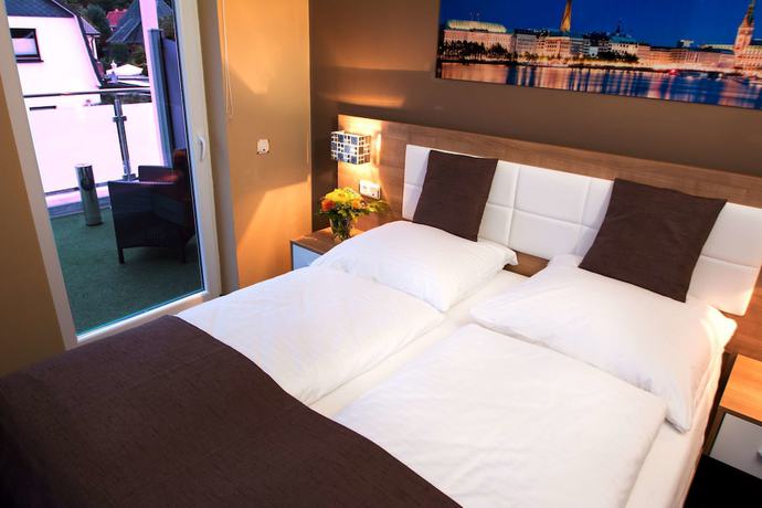 Imagen de la habitación del Hotel CandS. Foto 16