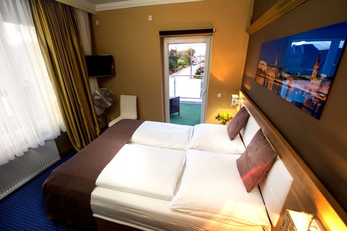Imagen de la habitación del Hotel CandS. Foto 18