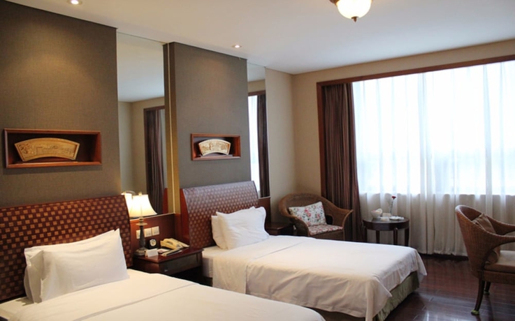 Imagen de la habitación del Hotel Candd Resort Wuyishan. Foto 4