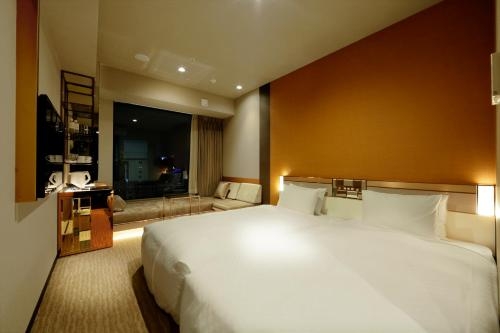 Imagen de la habitación del Hotel Candeo Hotels Tokyo Roppongi. Foto 9