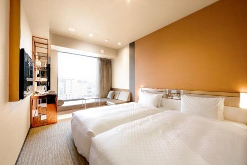 Imagen de la habitación del Hotel Candeo Hotels Tokyo Roppongi. Foto 10
