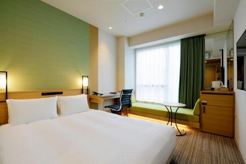 Imagen de la habitación del Hotel Candeo Hotels Tokyo Shimbashi. Foto 6