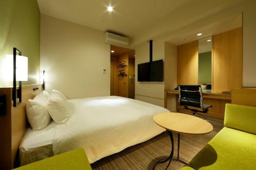 Imagen de la habitación del Hotel Candeo Hotels Tokyo Shimbashi. Foto 7