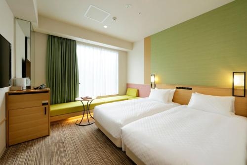 Imagen de la habitación del Hotel Candeo Hotels Tokyo Shimbashi. Foto 8