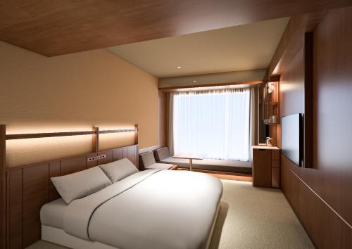 Imagen de la habitación del Hotel Candeos Kumamoto Shinshigai. Foto 13