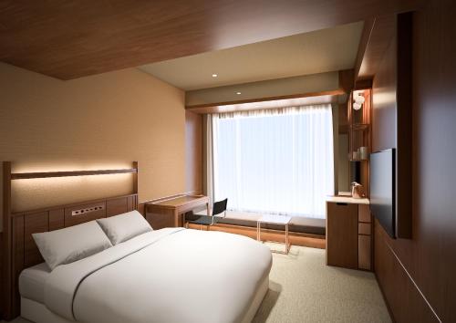 Imagen de la habitación del Hotel Candeos Kumamoto Shinshigai. Foto 14