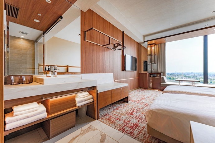 Imagen de la habitación del Hotel Candeos Osaka Hirakata. Foto 15