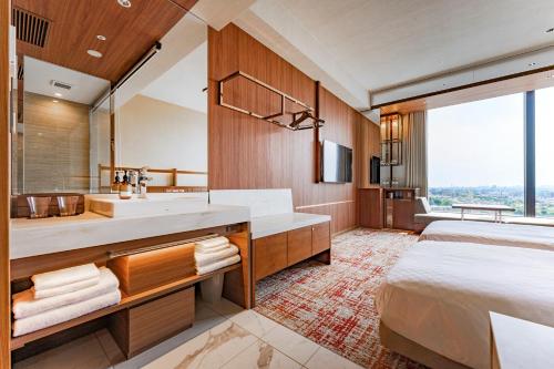 Imagen de la habitación del Hotel Candeos Osaka Hirakata. Foto 18