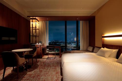 Imagen de la habitación del Hotel Candeos Osaka Hirakata. Foto 20