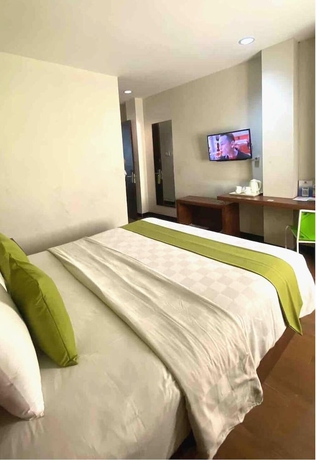 Imagen de la habitación del Hotel Candi Indah Semarang. Foto 9